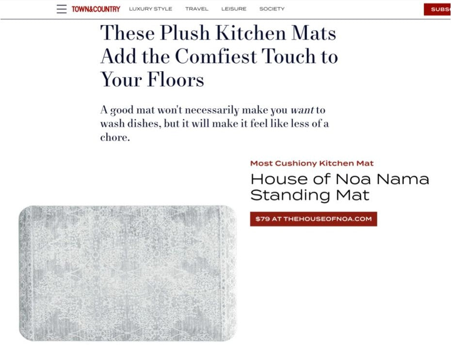 Screenshot of an article from Town & Country titled "These Plush Kitchen Mats Add the Comfiest Touch to Your Floors" featuring the House of Noa Nama Standing Mat